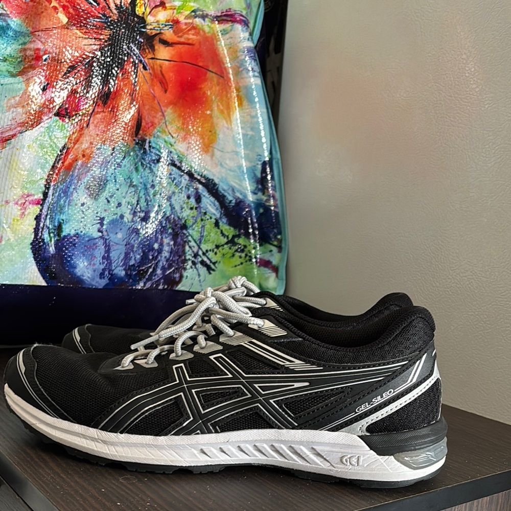 Black, Silver and White Running Shoes